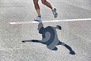 Man standing on 400 meter dash