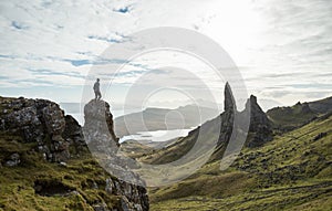 Man standing above a Scottish Highland landscape