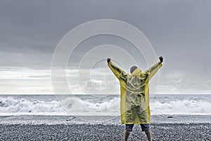 Man standing against the ocean