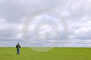 Man standing alone in a field