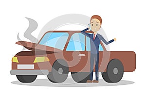 Man standing at the broken car and calling