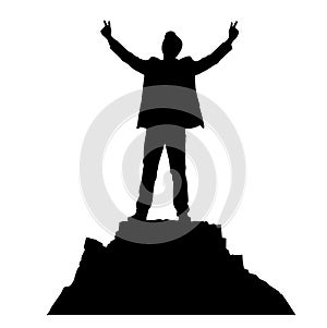 Man Standing in Mountain with raising hand, successful concept, business