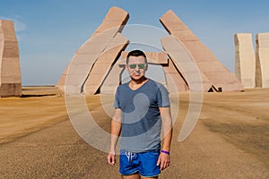 Man standing near huge Gate of Allah, Ras Mohammed national park in Egypt. Desert photo