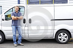 Man standing next to van