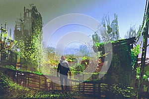 Man standing on old bridge in overgrown city