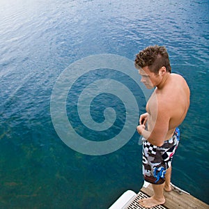 Man standing on pier