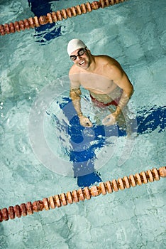 Man Standing in Pool