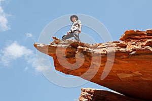 Man standing on the rock edge