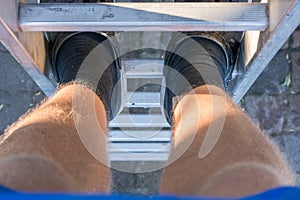 Wrong shoes on a ladder