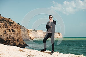 Man standing on the stone. Travel concept