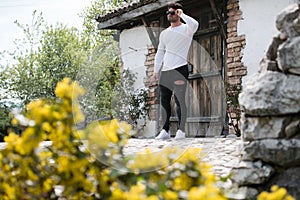 Man Standing Strong Outdoors in Nature Posing