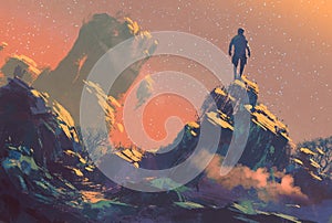 Man standing on top of the hill