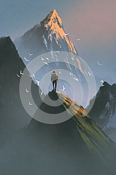 Man standing on top of mountain