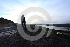 Man standing view mountains of Pha Taem National Park