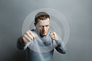 Man stands in a boxing stance