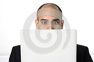 Man stares at his laptop screen