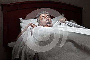 Man startled awake by intruder photo