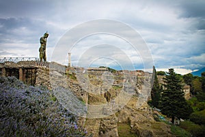 Man Statue Grief over Pompeii Ruins, Italy