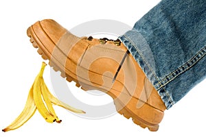 Man stepping on banana peel