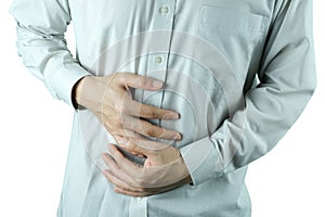 A man Stomach ache because of gastritis or that are sign of stomach trouble. background white. Health concept
