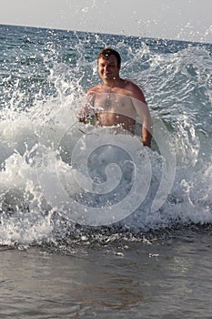 Man in stormy sea