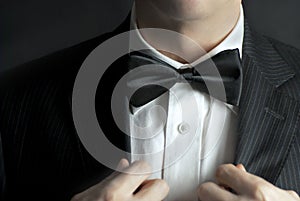 Man Straightens Tux photo