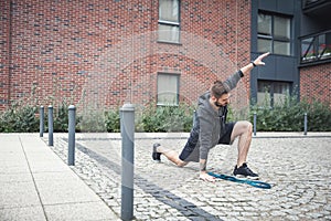 Streching. Urban outdoor activities. photo