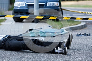 Man on the street after accident