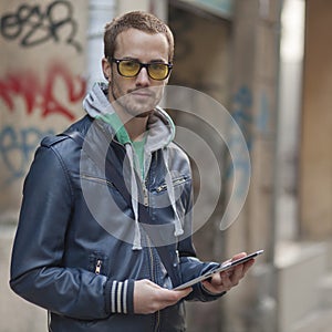 Man On Street Use Ipad Tablet Computer