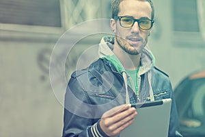 Man On Street Use Ipad Tablet Computer