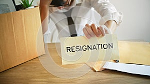 Man stressing with resignation letter for quit a job photo
