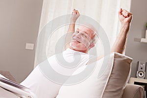 Man stretching and going asleep photo
