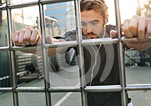 A man stretching worming before exercising photo