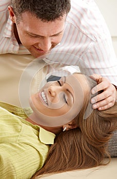 Man stroking woman's hair photo