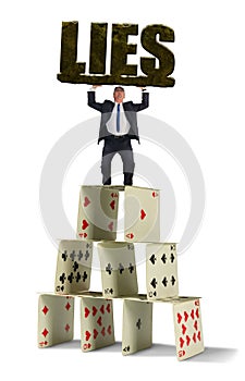 Man struggling to hold up giant stone LIES on shaky house of cards representing the dangerous situation in his web of deceit