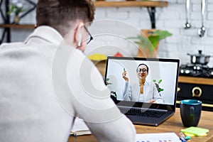 Man, studies remotely via video call