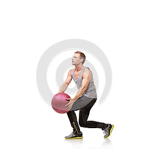 Man in studio with fitness, medicine ball and mockup for exercise, body wellness and commitment. Workout, muscle