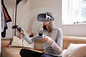 Man In Studio Wearing Virtual Reality Headset Playing Game