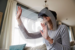 Man In Studio Wearing Virtual Reality Headset Playing Game