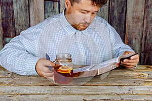 Man studying and reading Holy Bible