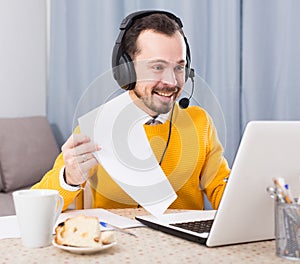 Man studying remotely at home