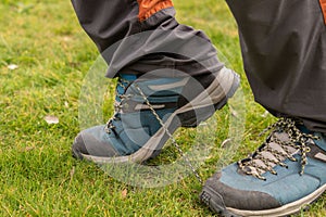 man stumbles over his bootlaces