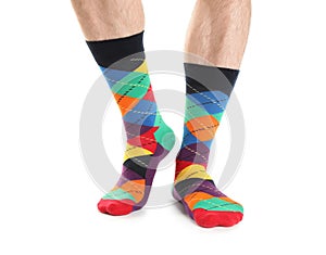 Man in stylish socks on white background