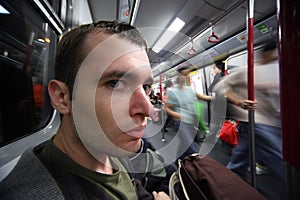 Man in subway car