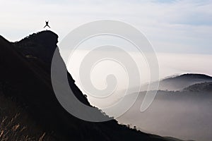 Man success top mountain view point