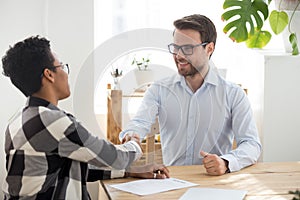 Man successfully passed interview handshake in office