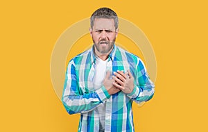 man suffer with heartache in studio. heartache suffer of caucasian man in shirt.