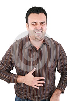 Man suffering from a bad stomach ache pain