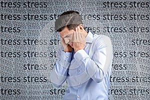 Man suffering from depression and words STRESS on grey background