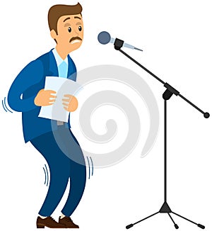 Man suffering from fear, phobia of public speaking. Frightened speaker standing near microphone